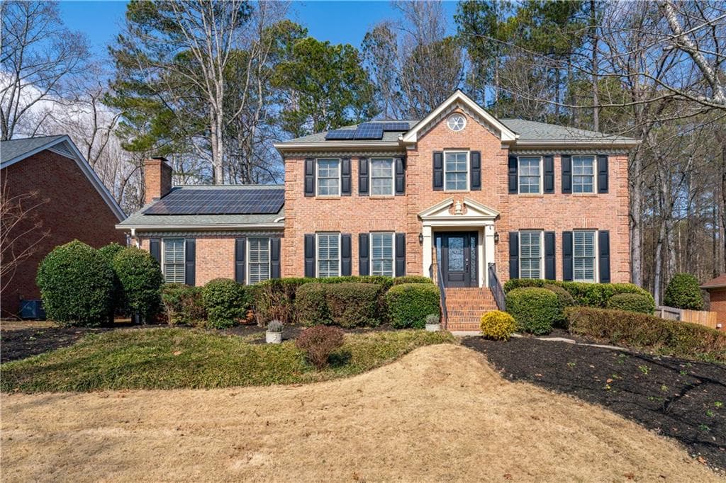4 bedroom, 3 bathroom, 3,215 sq ft single family residence sold at 6055 Courtside Drive, Peachtree Corners, GA 30092