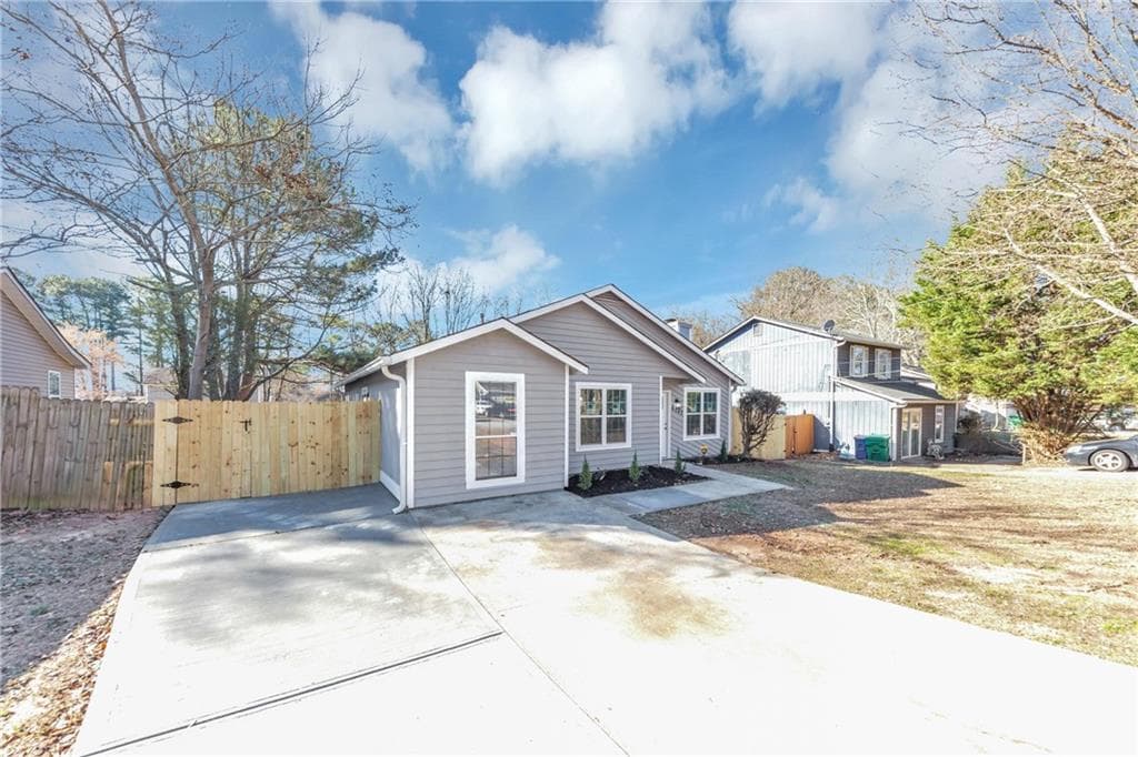 4 bedroom, 2 bathroom single family residence sold at 6042 Creekford Drive, Lithonia, GA 30058