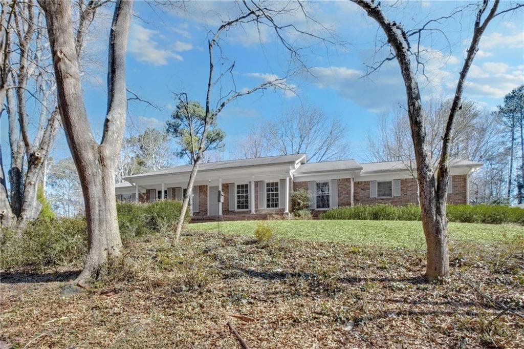 4 bedroom, 3 bathroom, 2,328 sq ft single family residence sold at 6185 Heards Creek Drive, Atlanta, GA 30328
