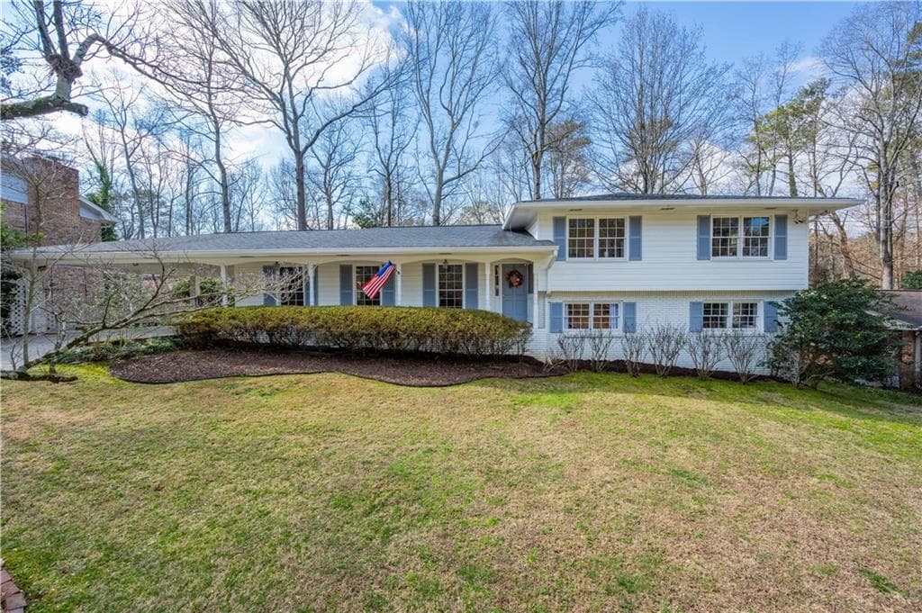 4 bedroom, 3 bathroom single family residence sold at 165 Devonwood Drive, Sandy Springs, GA 30328