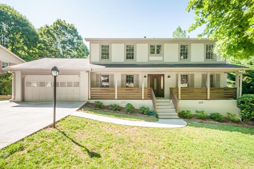 5 bedroom, 3 bathroom single family residence sold at 2647 WOOD HOLLOW Drive, Dunwoody, GA 30360