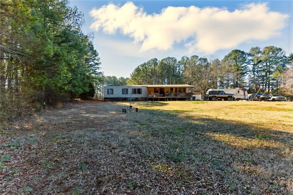 3 bedroom, 2 bathroom single family residence sold at 1515 Ozora Road, Loganville, GA 30052