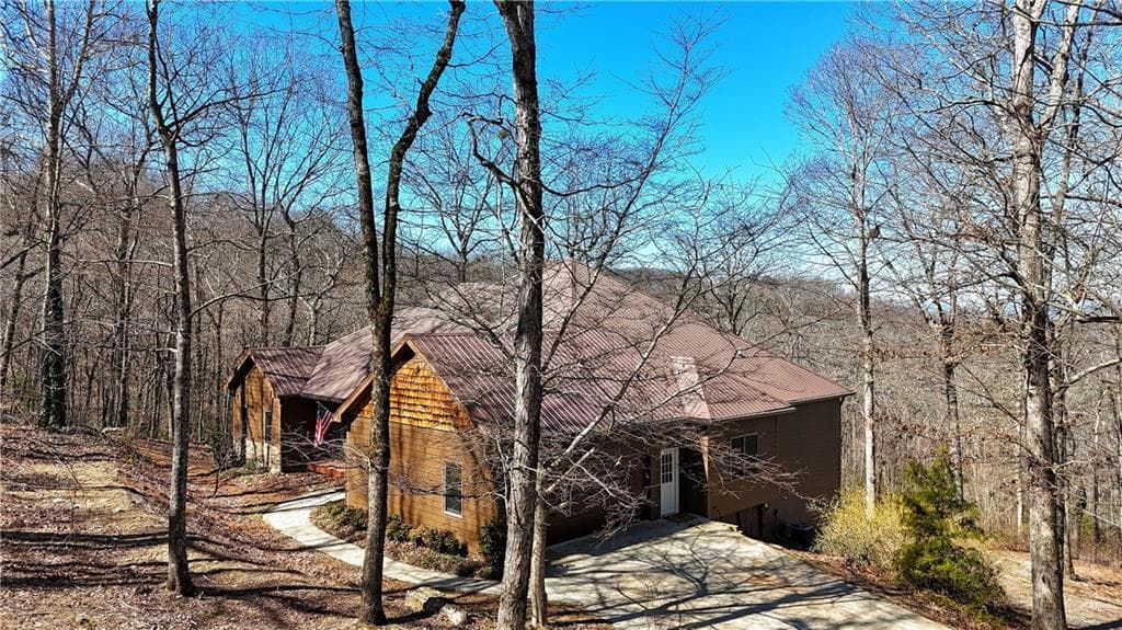 4 bedroom, 3 bathroom single family residence sold at 790 Old Burnt Mountain Road, Ellijay, GA 30536