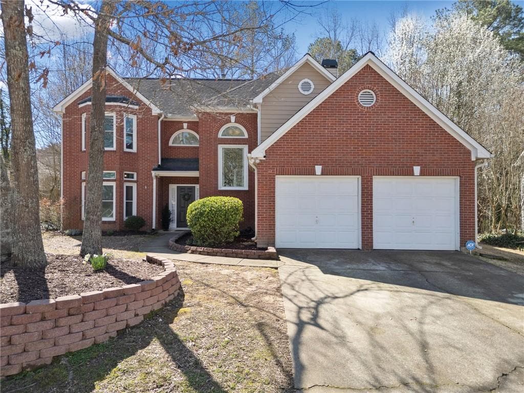 4 bedroom, 3 bathroom single family residence sold at 7104 Big Woods Drive, Woodstock, GA 30189