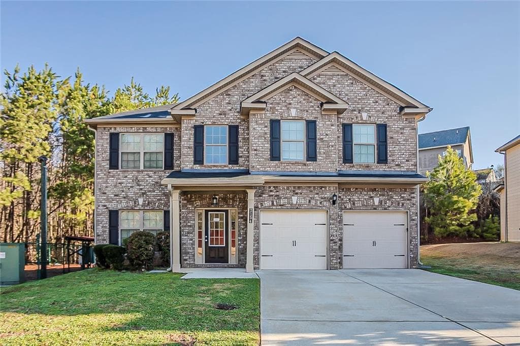 4 bedroom, 3 bathroom, 2,816 sq ft single family residence sold at 2154 Dodson Woods Drive, Fairburn, GA 30213