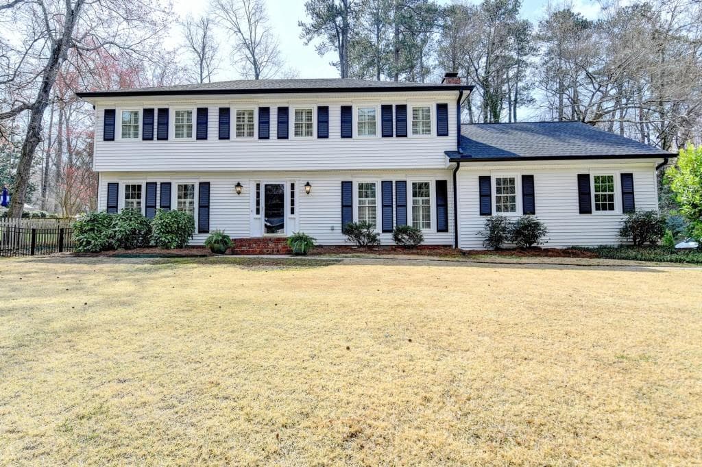 4 bedroom, 3 bathroom single family residence sold at 1643 North Springs Drive, Dunwoody, GA 30338