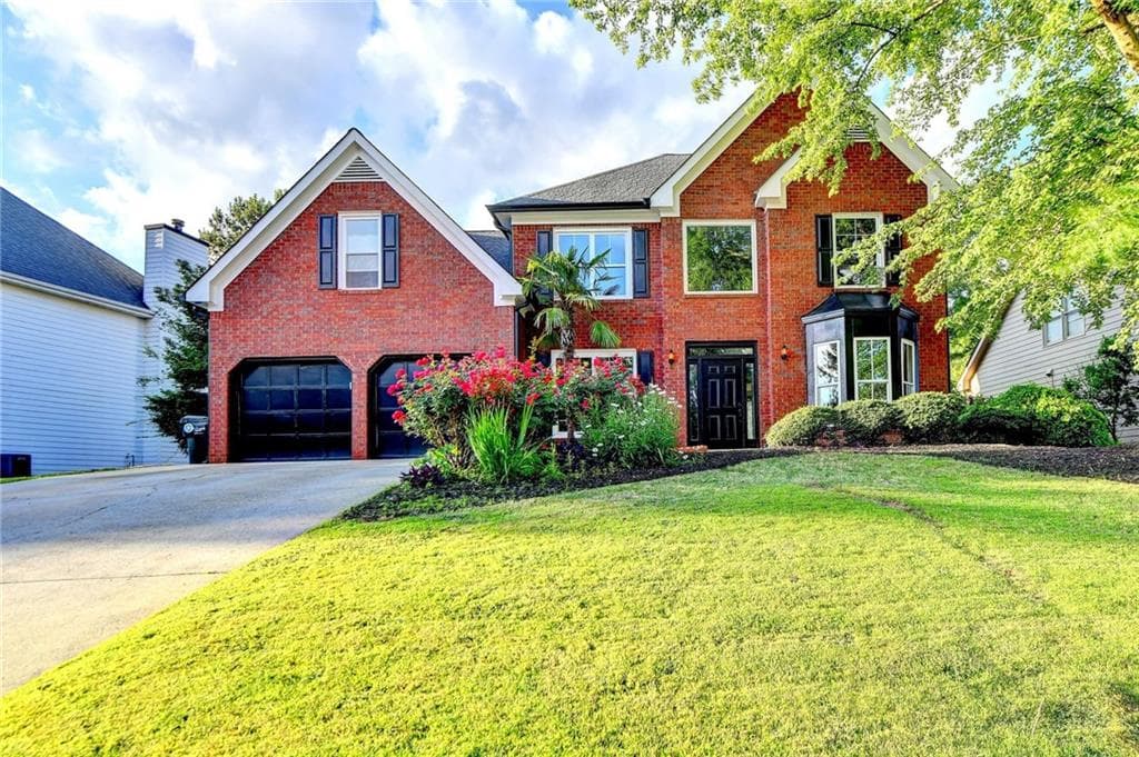 4 bedroom, 3 bathroom single family residence sold at 1887 Lake Ridge Terrace, Lawrenceville, GA 30043