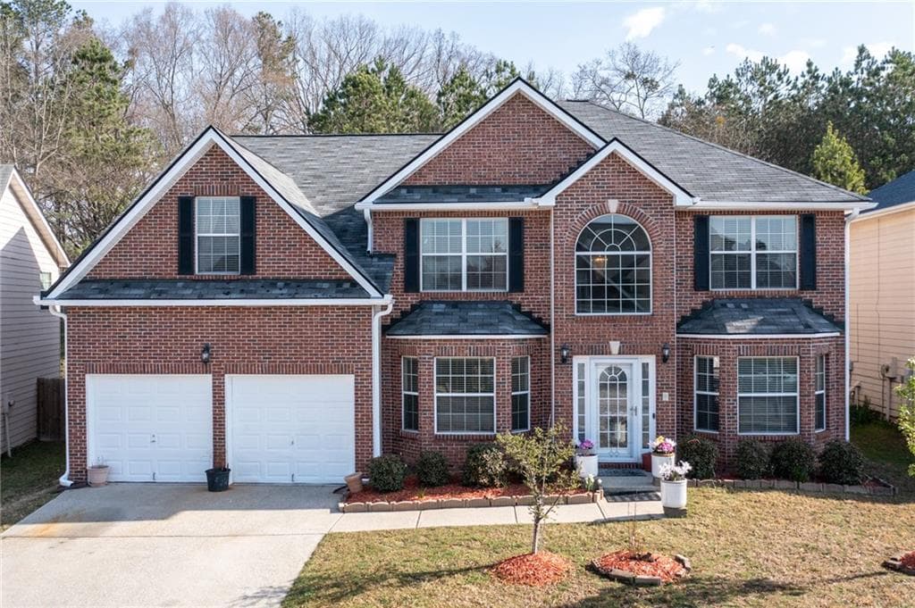 5 bedroom, 3 bathroom single family residence sold at 1893 Tulip Petal Road, Auburn, GA 30011
