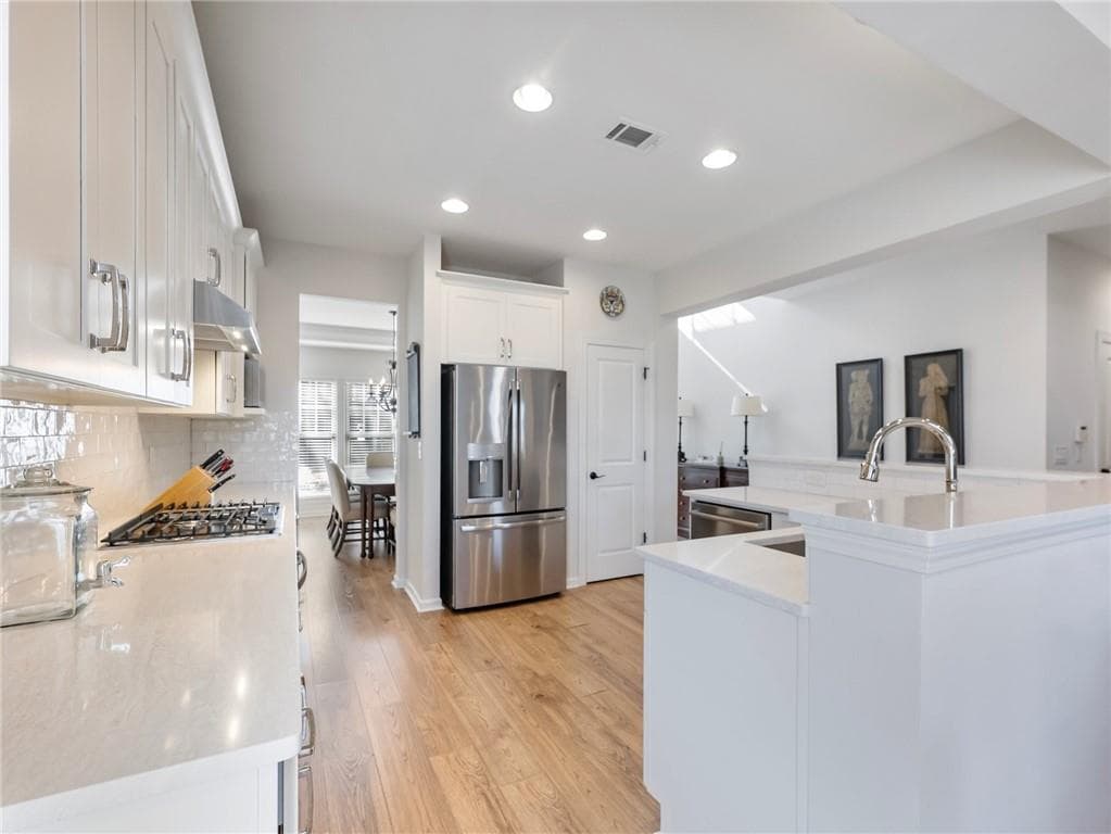 4 bedroom, 3 bathroom single family residence sold at 7839 Keepsake Lane, Flowery Branch, GA 30542