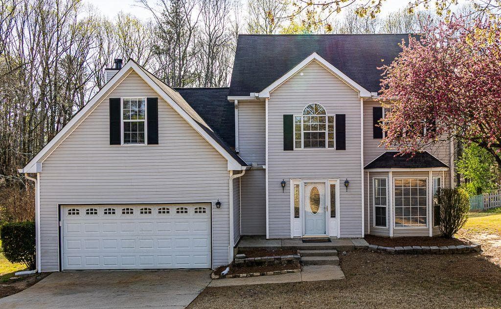4 bedroom, 3 bathroom single family residence sold at 2812 LAKE VISTA Drive, Buford, GA 30519