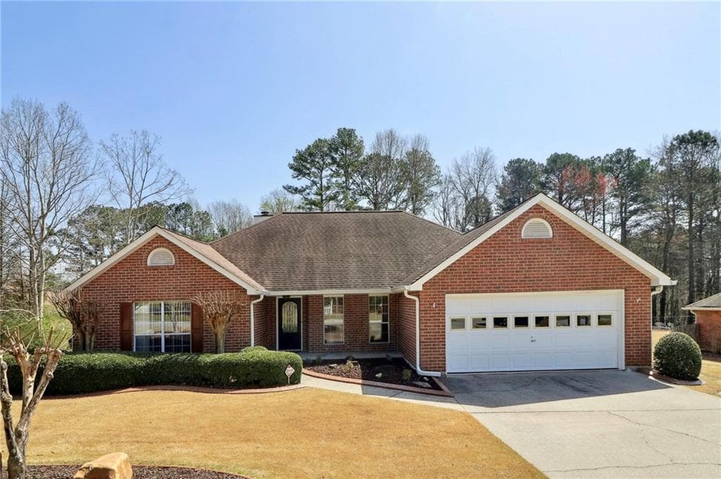 4 bedroom, 2 bathroom single family residence sold at 3309 Saddlegate Court, Buford, GA 30519