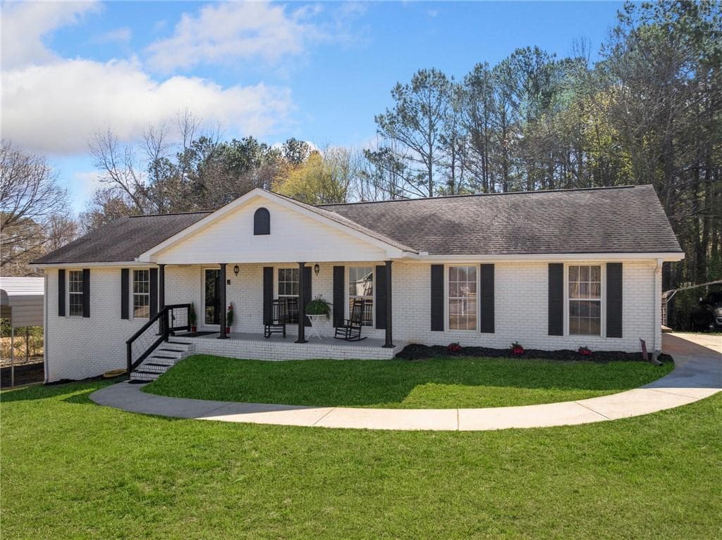 4 bedroom, 3 bathroom single family residence sold at 4885 Pisgah Road, Cumming, GA 30028