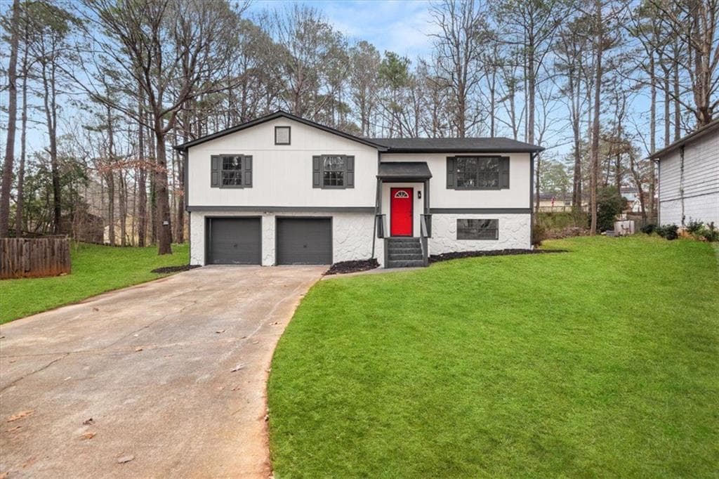 4 bedroom, 2 bathroom single family residence sold at 7012 WINTER WOODS Court, Morrow, GA 30260