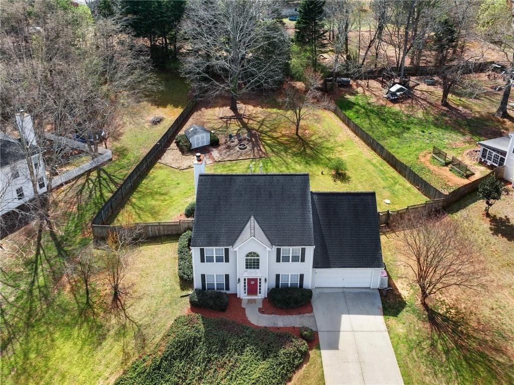 4 bedroom, 3 bathroom single family residence sold at 6455 N Glen Drive, Cumming, GA 30028