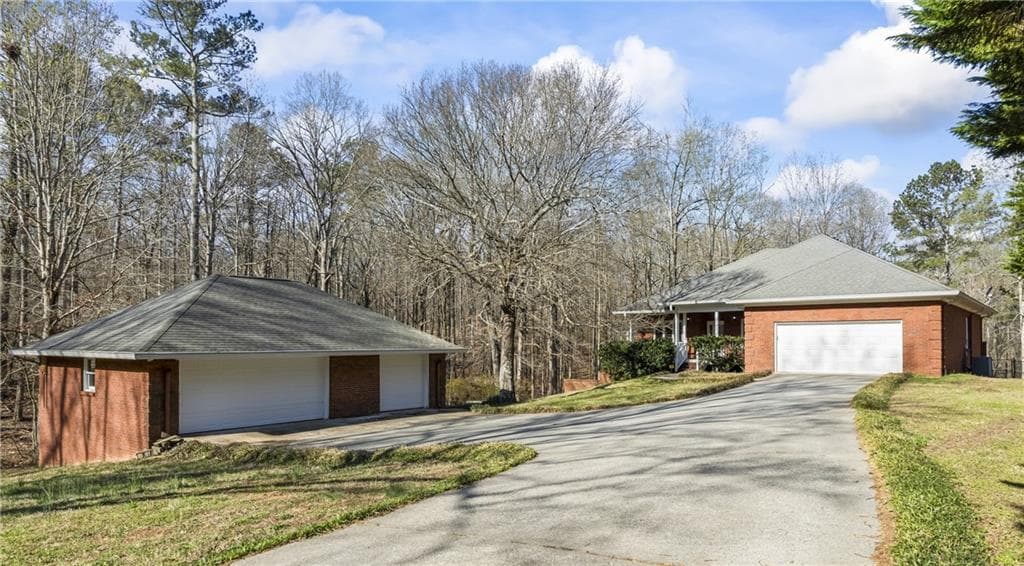 4 bedroom, 3 bathroom single family residence sold at 5595 Rolling Acres Lane, Cumming, GA 30028