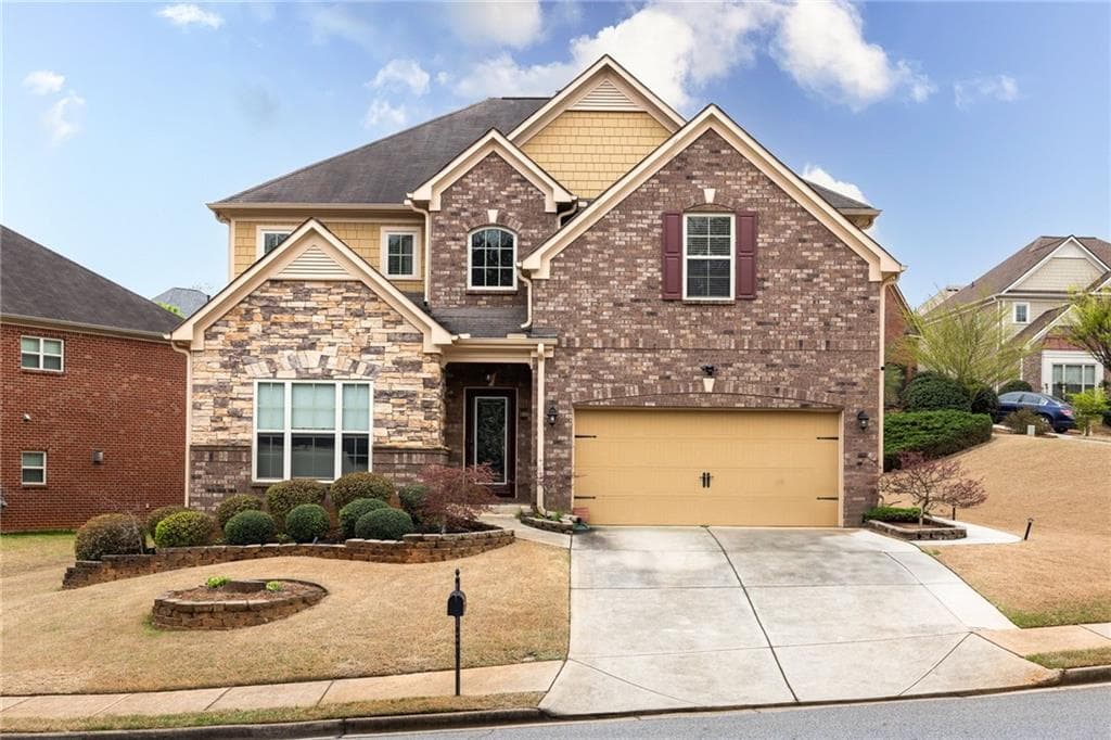 4 bedroom, 3 bathroom single family residence sold at 5877 Stow Drive, Tucker, GA 30084