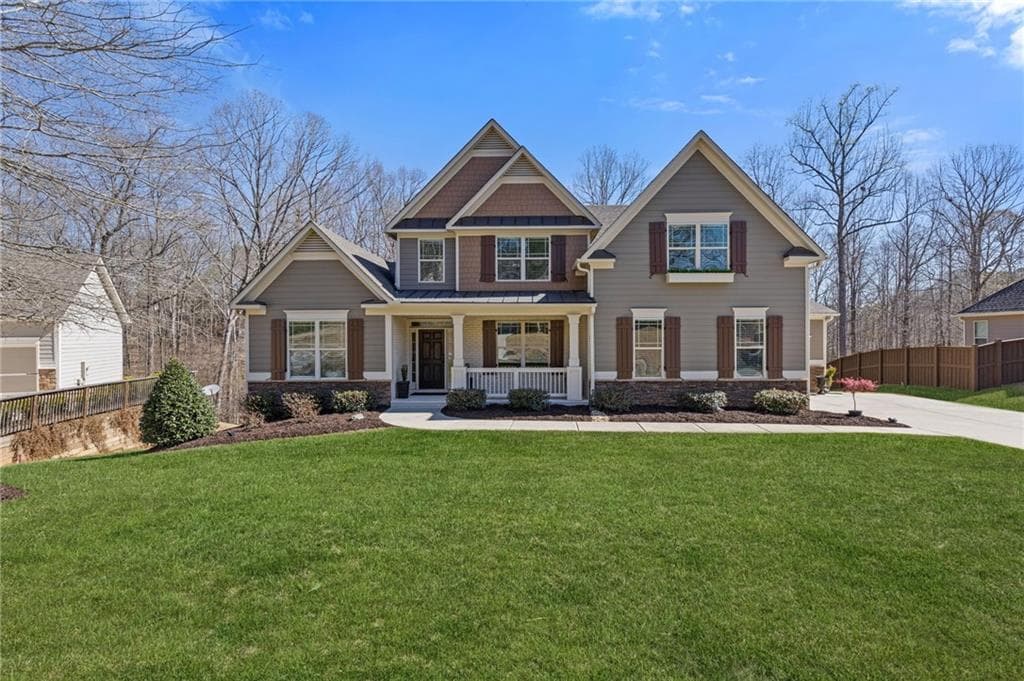 4 bedroom, 4 bathroom single family residence sold at 5977 Wildcreek Road, Sugar Hill, GA 30518