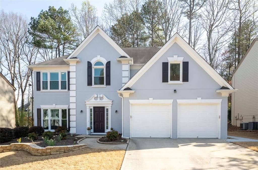 4 bedroom, 3 bathroom single family residence sold at 10715 Glenbarr Drive, Johns Creek, GA 30097