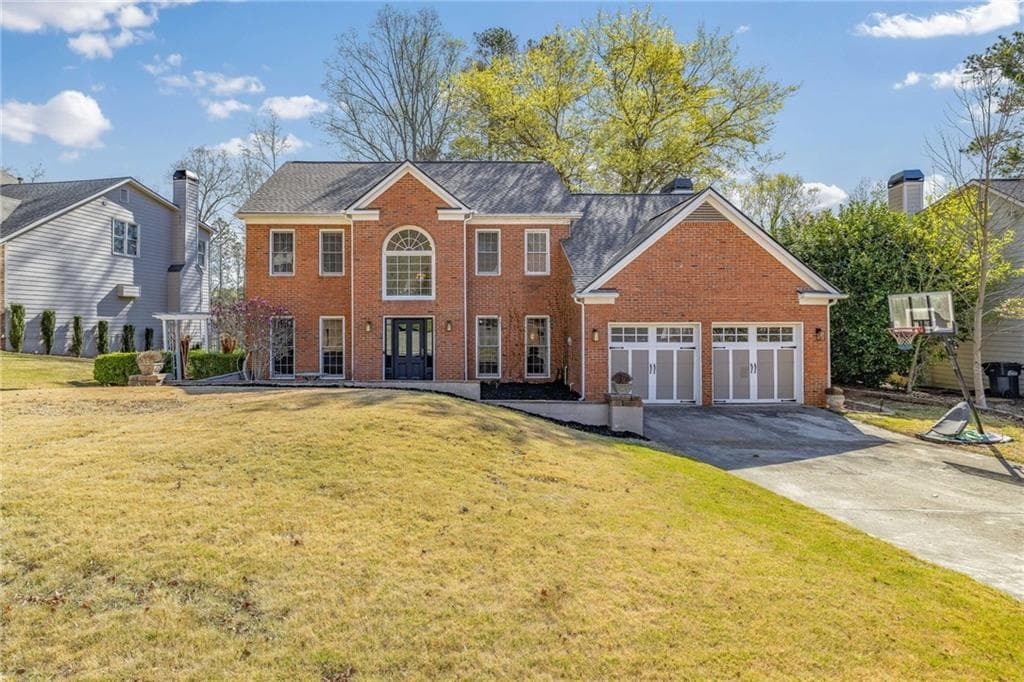 5 bedroom, 3 bathroom single family residence sold at 2212 Nine Oaks Drive, Kennesaw, GA 30152