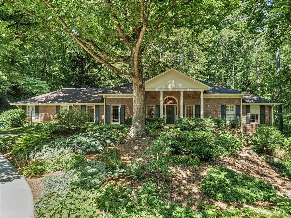 5 bedroom, 4 bathroom single family residence sold at 4590 Lake Forrest Drive, Atlanta, GA 30342