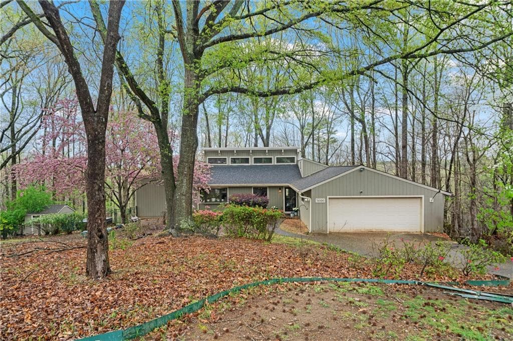 6 bedroom, 3 bathroom single family residence sold at 3696 Suwanee Creek Court, Suwanee, GA 30024