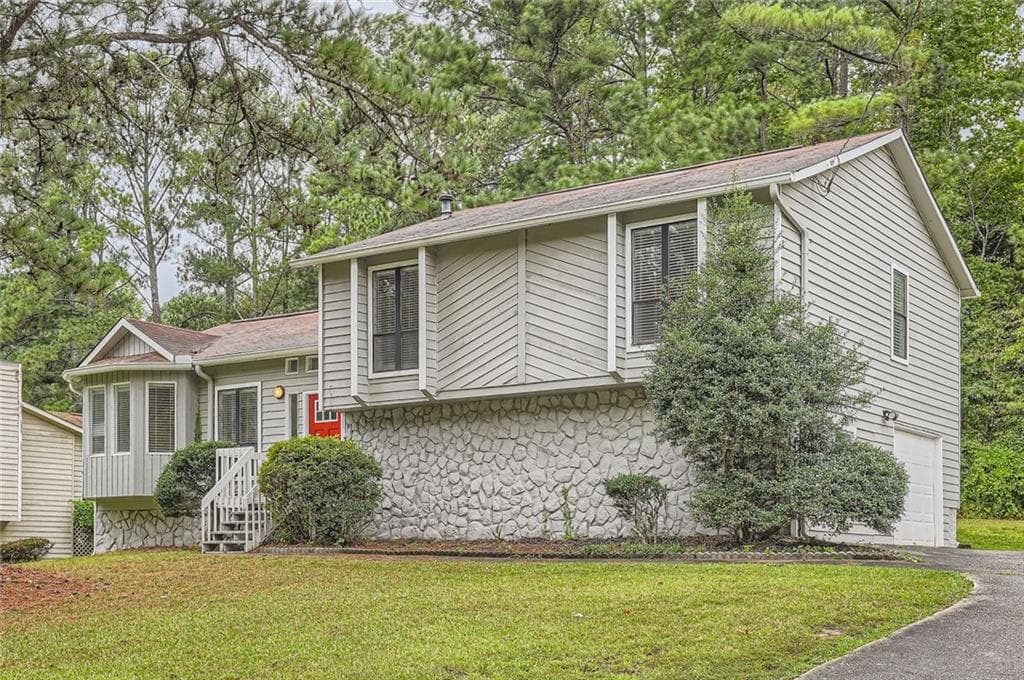 4 bedroom, 2 bathroom single family residence sold at 1945 Chateau Lane, Lithia Springs, GA 30122