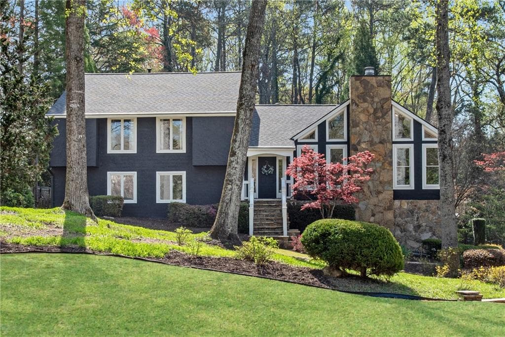 4 bedroom, 3 bathroom single family residence sold at 11630 Mountain Laurel Drive, Roswell, GA 30075