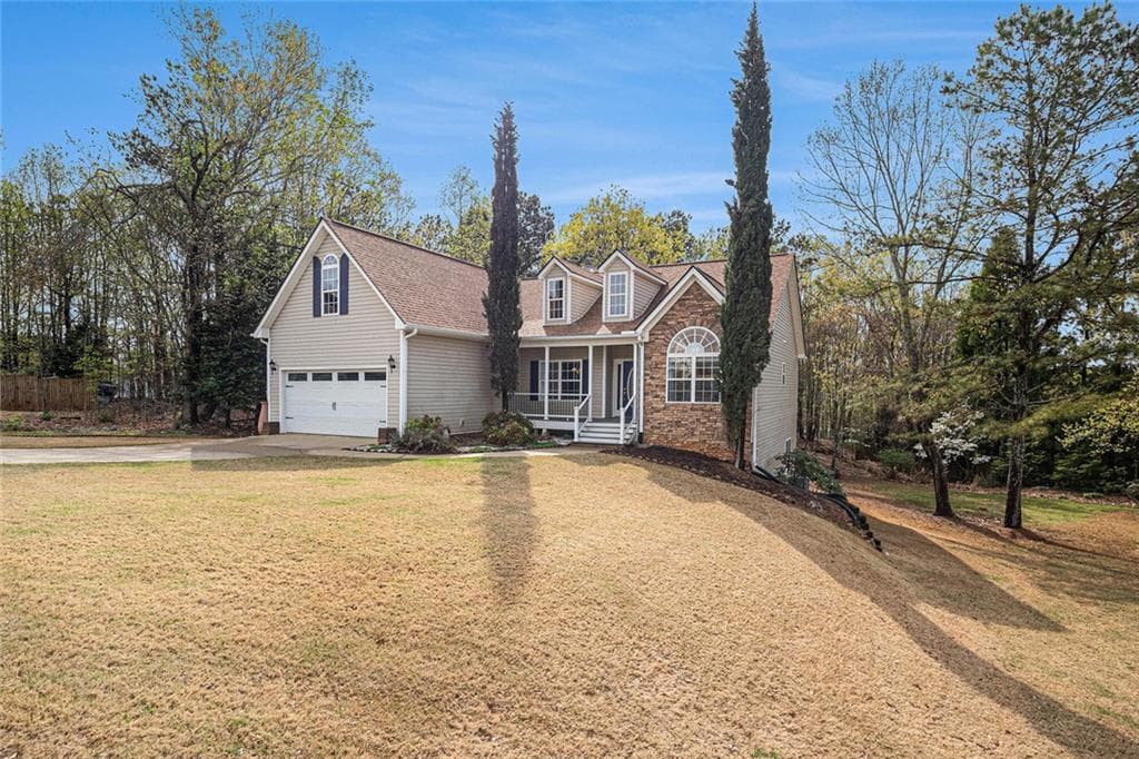 4 bedroom, 3 bathroom single family residence sold at 6529 Sundial Avenue, Flowery Branch, GA 30542