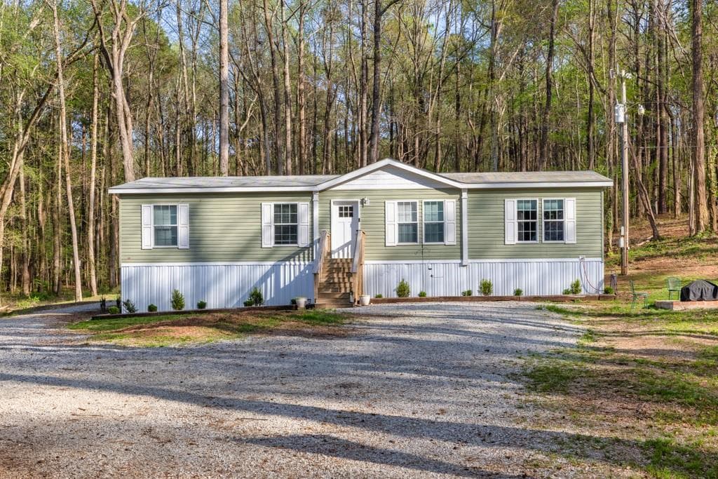 4 bedroom, 2 bathroom single family residence sold at 2466 Monroe Jersey Road, Covington, GA 30014