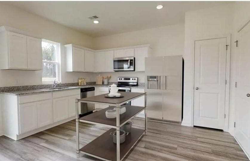 4 bedroom, 3 bathroom single family residence sold at 7763 Sudbury Circle, Covington, GA 30014