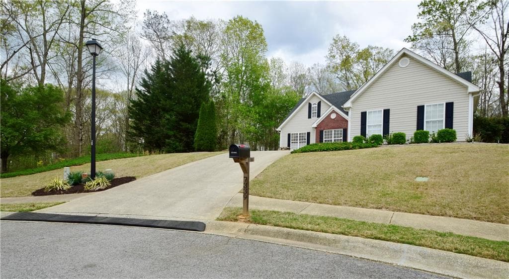 4 bedroom, 3 bathroom single family residence sold at 7339 LITANY Court, Flowery Branch, GA 30542