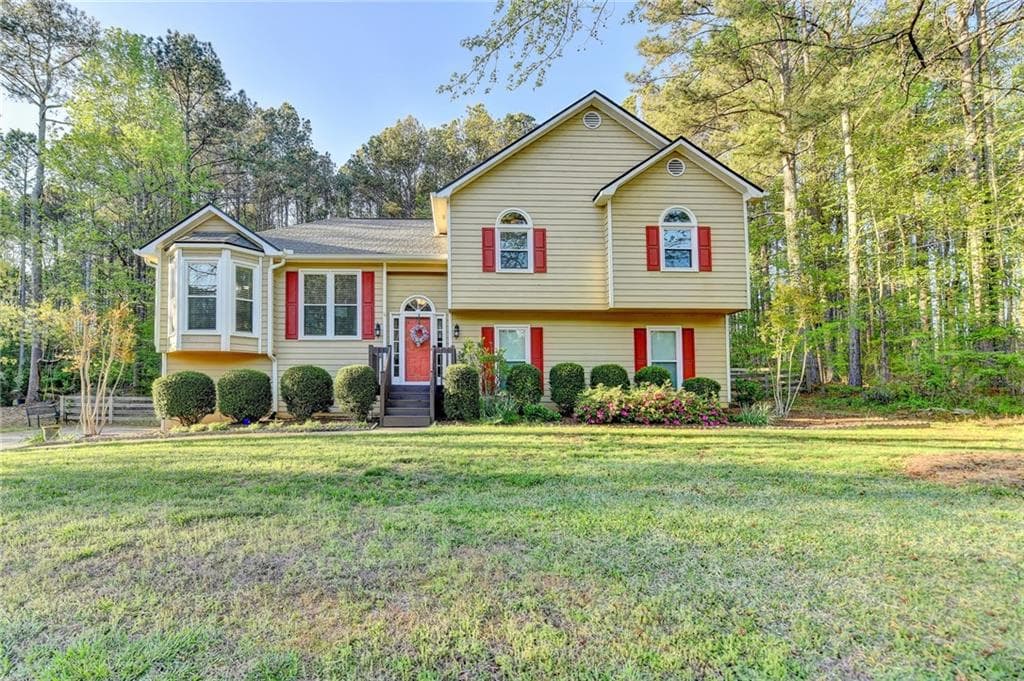 3 bedroom, 2 bathroom, 2,179 sq ft single family residence sold at 6040 Carriage Drive, Cumming, GA 30028