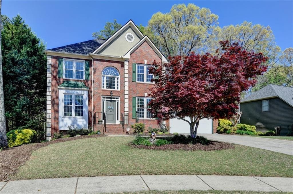 5 bedroom, 4 bathroom, 3,589 sq ft single family residence sold at 320 Hillside Manor Drive, Sugar Hill, GA 30518