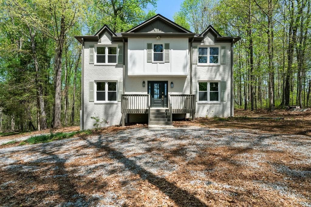 4 bedroom, 3 bathroom single family residence sold at 7771 A C Smith Road, Cumming, GA 30028