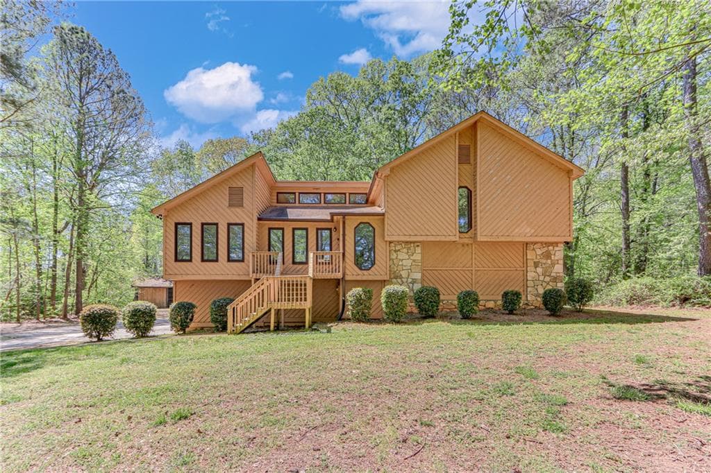 4 bedroom, 2 bathroom single family residence sold at 1552 Sever Road, Lawrenceville, GA 30043