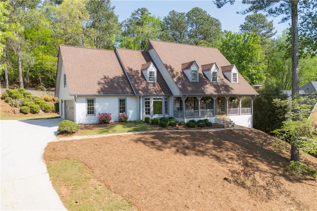 4 bedroom, 5 bathroom single family residence sold at 7700 Dunvegan Close, Atlanta, GA 30350