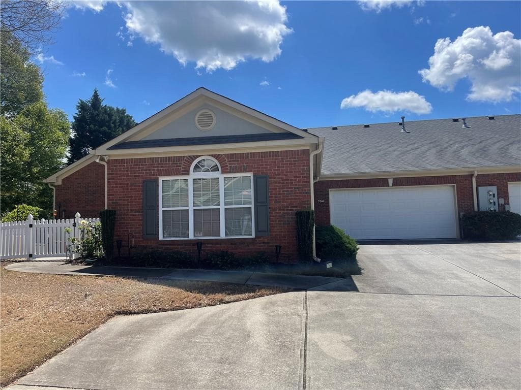 2 bedroom, 2 bathroom, 1,328 sq ft condominium sold at 119 Holiday Road 704, Buford, GA 30518