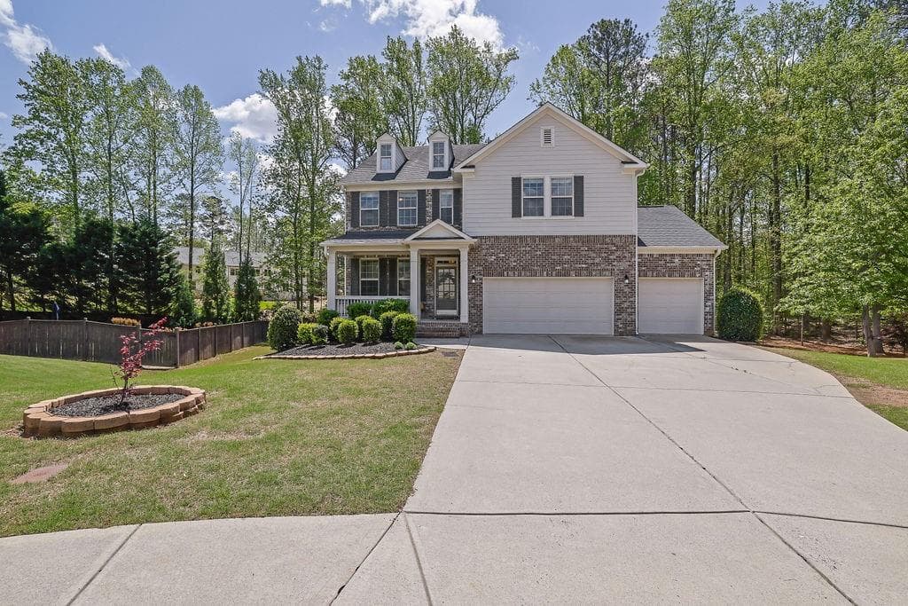 6 bedroom, 5 bathroom single family residence sold at 21 Belmore Manor Drive, Suwanee, GA 30024