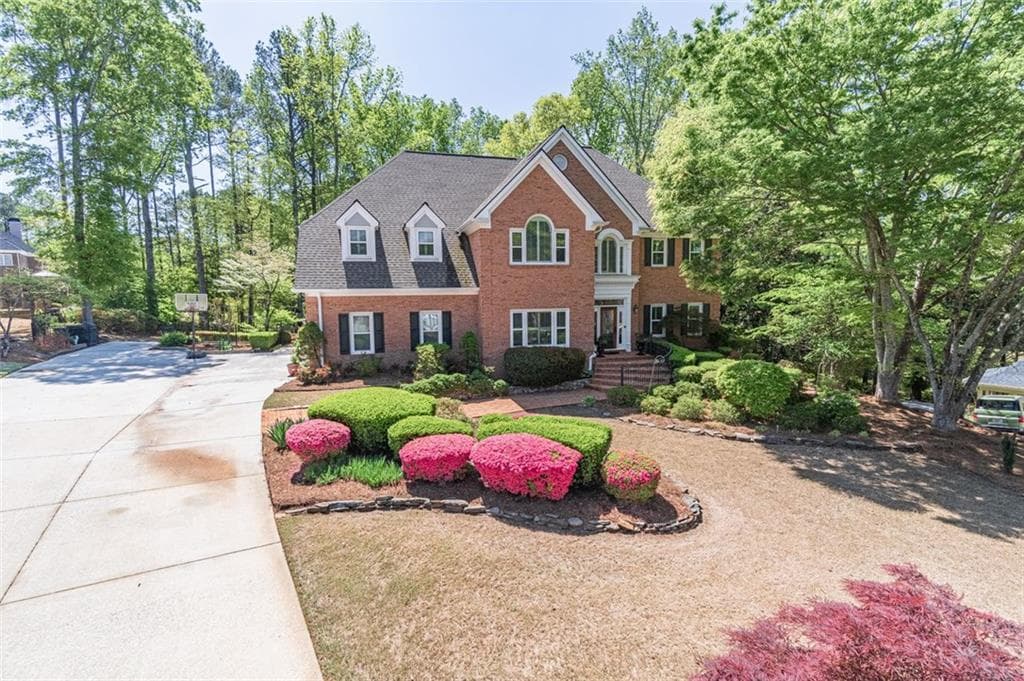 5 bedroom, 5 bathroom, 4,857 sq ft single family residence sold at 860 CRAMAC Drive, Lawrenceville, GA 30046