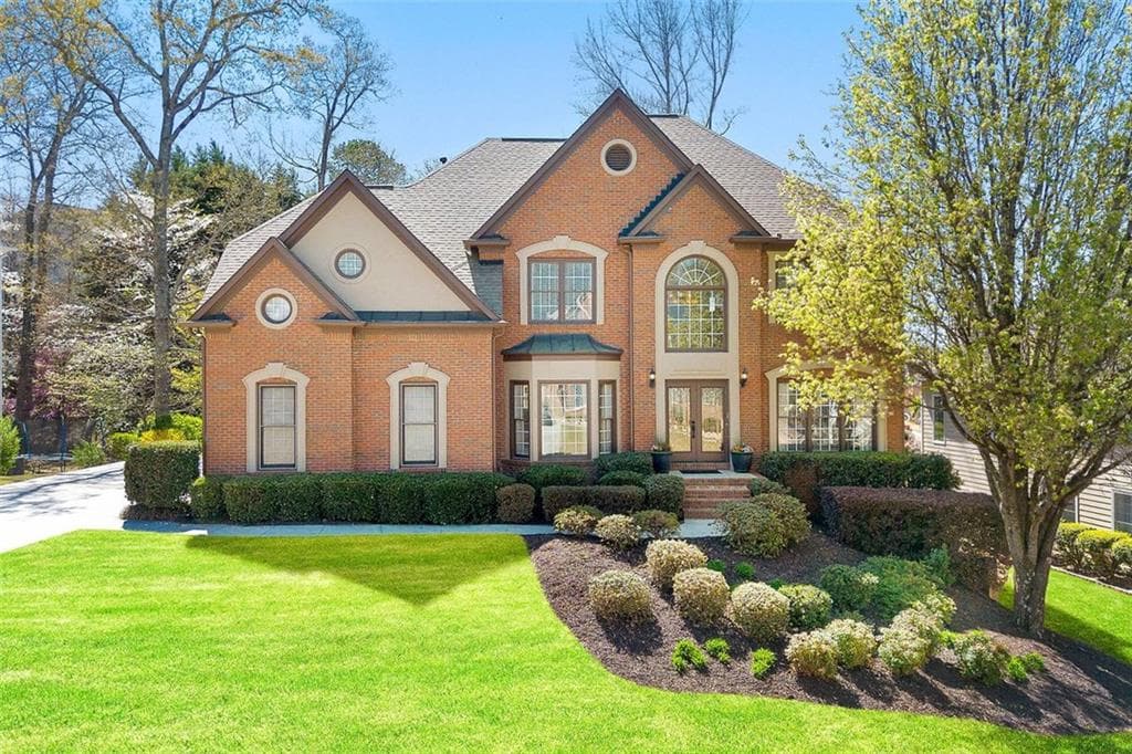 6 bedroom, 5 bathroom single family residence sold at 317 VISTA LAKE Drive, Suwanee, GA 30024