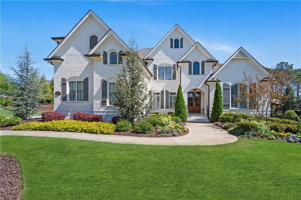 6 bedroom, 7 bathroom, 8,038 sq ft single family residence sold at 12555 Waters Edge Drive, Milton, GA 30004