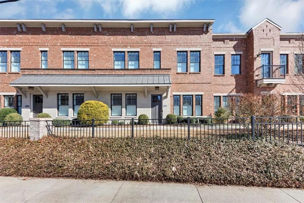 3 bedroom, 4 bathroom, 3,000 sq ft townhouse sold at 8217 Main Street, Woodstock, GA 30188