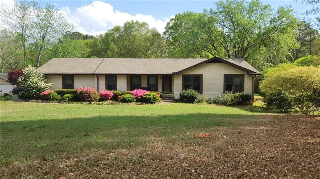 3 bedroom, 2 bathroom single family residence sold at 4909 WOODHURST Way, Stone Mountain, GA 30088