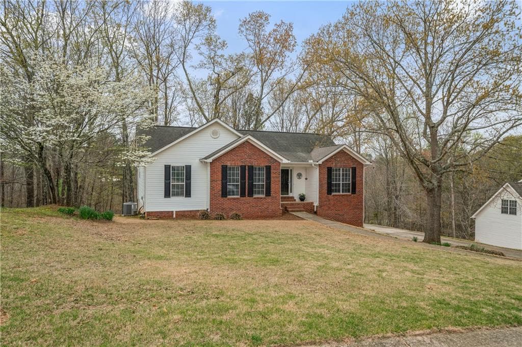 4 bedroom, 3 bathroom single family residence sold at 5550 Chestnut Creek Lane, Flowery Branch, GA 30542