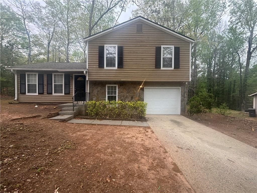 3 bedroom, 2 bathroom single family residence sold at 883 Greenhedge Drive, Stone Mountain, GA 30088