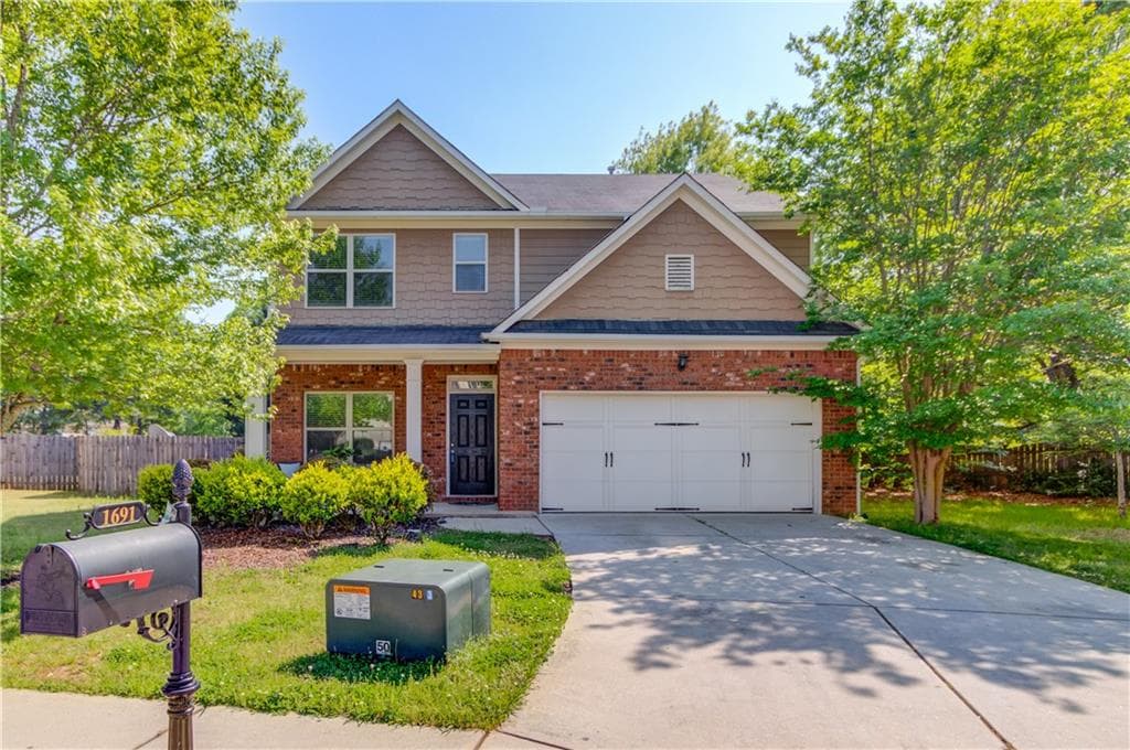 5 bedroom, 3 bathroom, 2,511 sq ft single family residence sold at 1691 Scenic Pines Drive, Lawrenceville, GA 30044