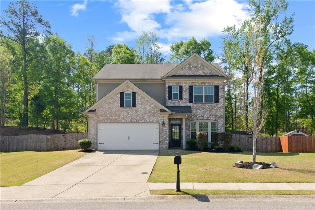4 bedroom, 3 bathroom single family residence sold at 4150 Spring Ridge Drive, Cumming, GA 30028