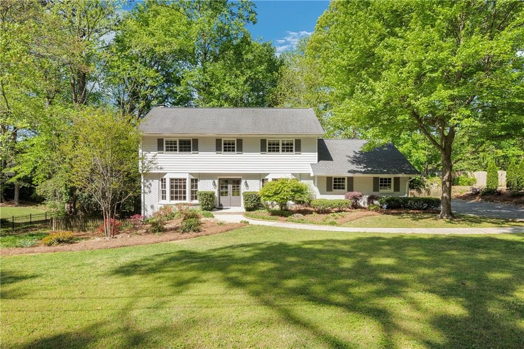 4 bedroom, 3 bathroom single family residence sold at 1486 Kings Down Circle, Dunwoody, GA 30338