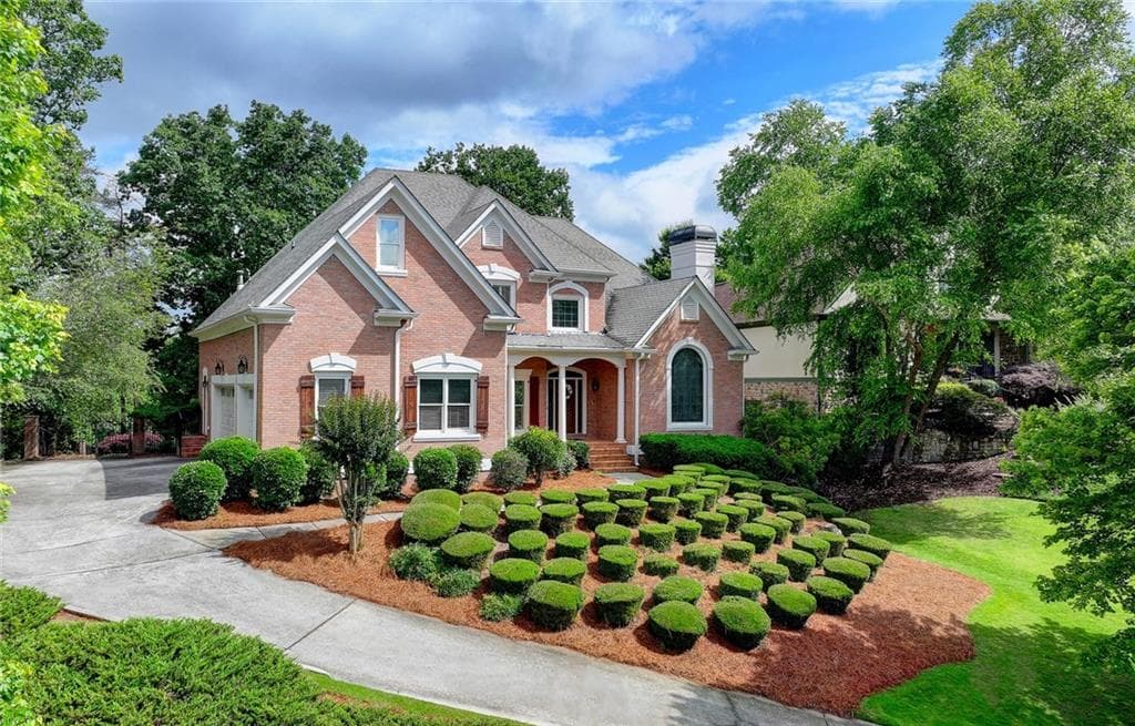 5 bedroom, 5 bathroom single family residence sold at 7050 Redcliff Court, Suwanee, GA 30024