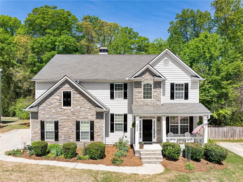5 bedroom, 4 bathroom single family residence sold at 1609 Sahale Falls Drive, Braselton, GA 30517